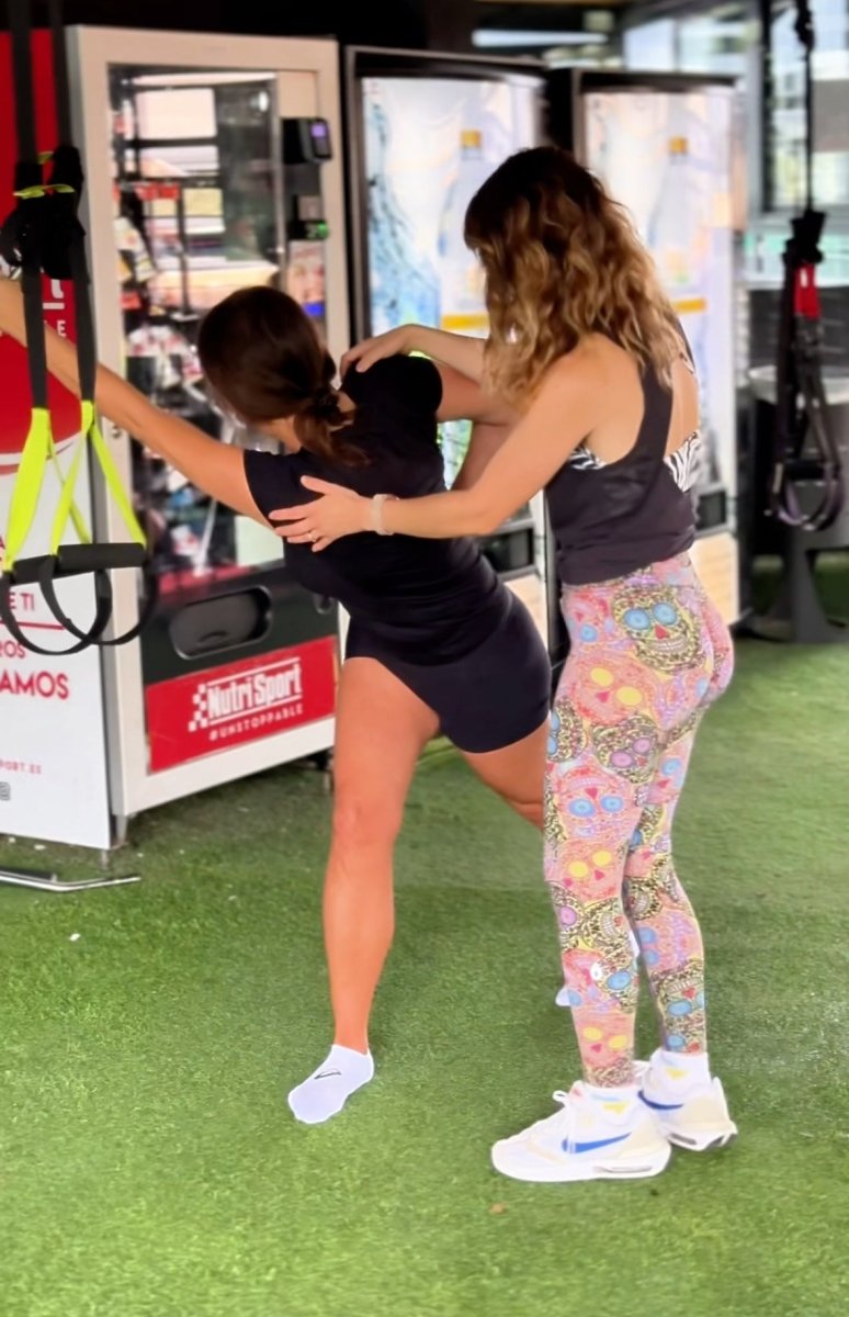 “Fitness trainer in Marbella helping clients build strength and endurance.”